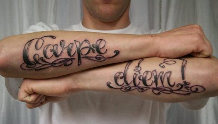 Carpe diem - a winged Latin expression meaning live in the present, seize the moment tattoo