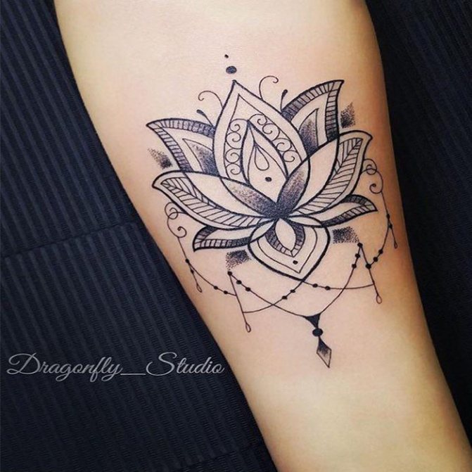 beautiful lotus flower on his arm