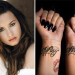 Demi Lovato with tattoos on her wrist.