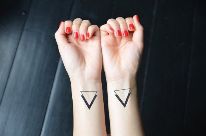 two triangle tattoo