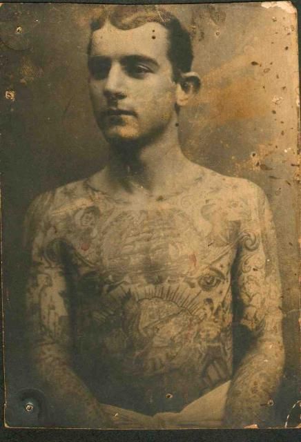 man with tattoos from the 1910s