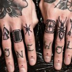 Men's tattoos on fingers