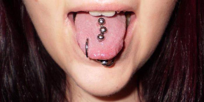 Multiple earrings in the tongue