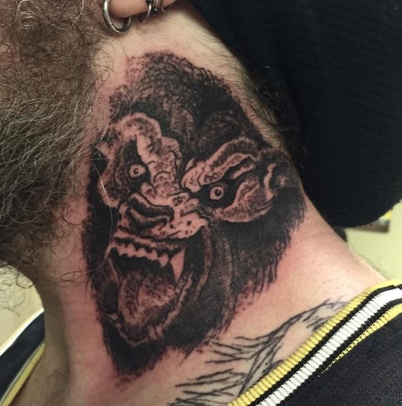 Werewolf on a guy's neck, tattoo