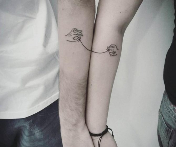 Pair tattoo in the form of a string