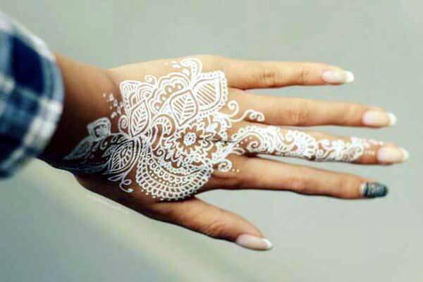 White henna hand painting