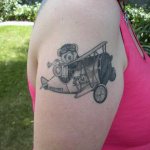 Airplane tattoo on shoulders