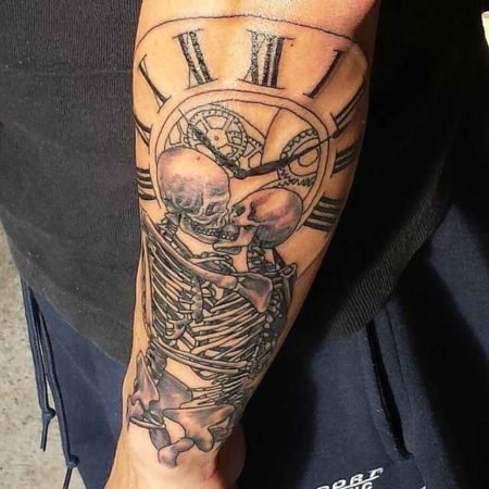 Skeleton, tattoo and watch, forearm