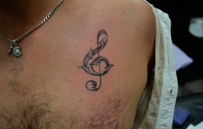 Treble clef tattoo serves as a reminder of a life of debauchery