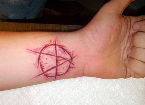 Tattoo anarchy on the wrist