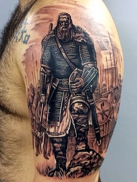 Tattoo bogatyr on a man's shoulder