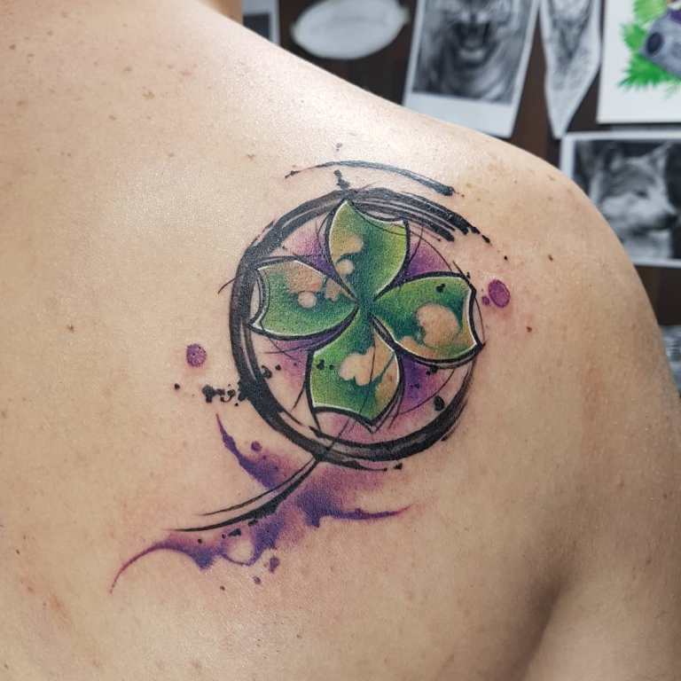 Tattoo of a colorful clover