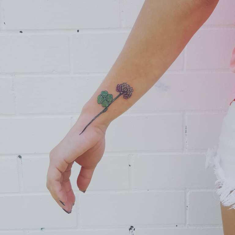Tattoo a flower of clover on your wrist