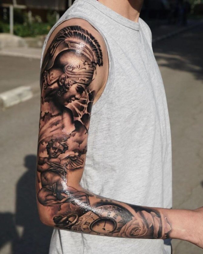 Tattoo of a gladiator on his shoulder