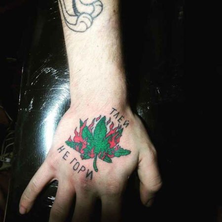 Tattoo cannabis on hand