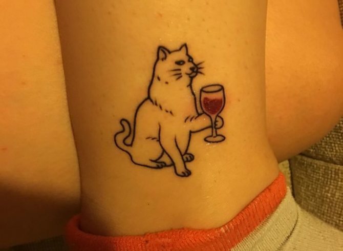 Cat and wine tattoo