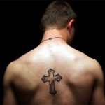Tattoo cross on back