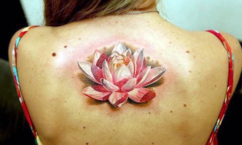 Tattoo water lily on his back