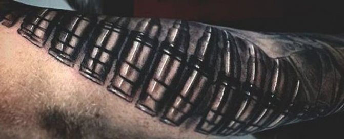 Tattoo ribbon of bullets