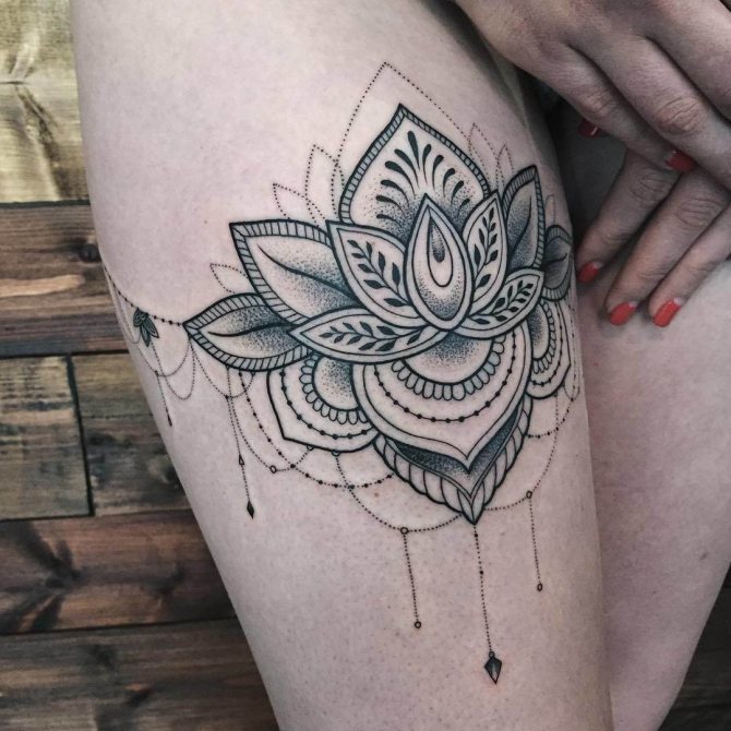 Lotus tattoo on legs