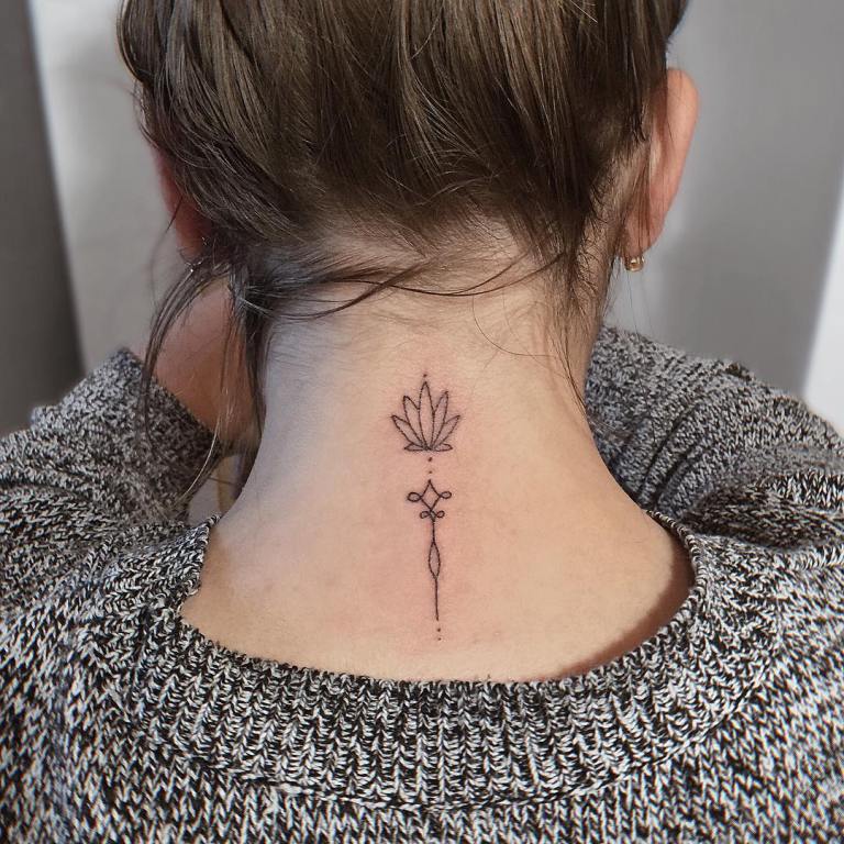 Tattoo a lotus on a girl's neck