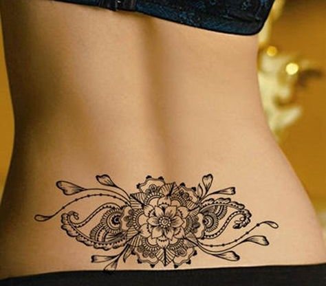 Tattoo on the coccyx for girls. Tattoo on the coccyx for girls.