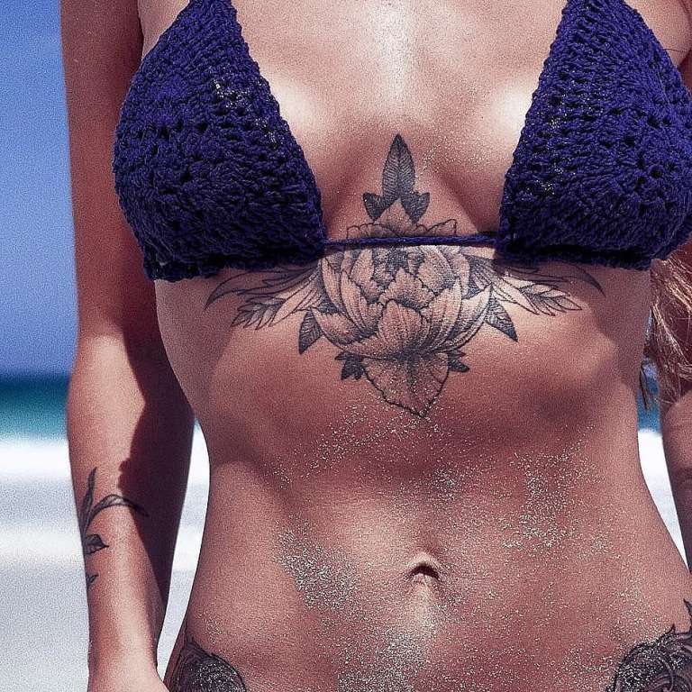 Tattoo below a girl's chest