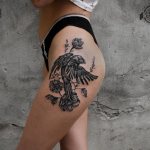 Tattoo of a bird - Tattoo of a bird on a leg - Tattoo of a bird on a leg