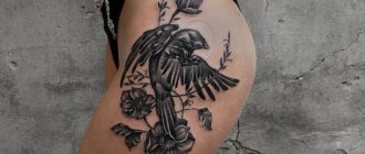 Tattoo of a bird - Tattoo of a bird on a leg - Bird tattoo on a leg