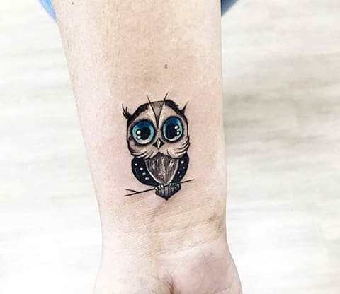 Tattoo of an owl on your wrist