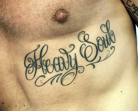 Tattoo with words on male - photo