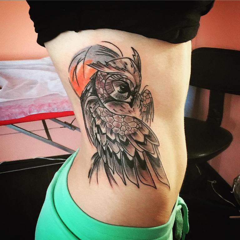 Tattoo girl's owl