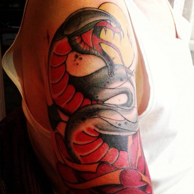 Tattoo threatening snake