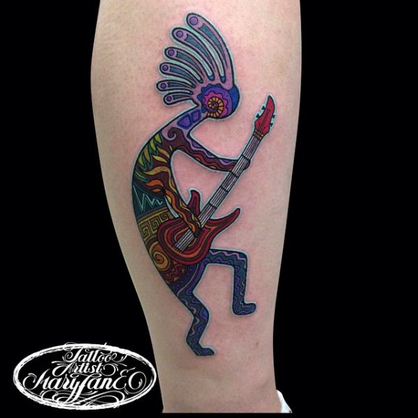 Kokopelli tattoo with guitar