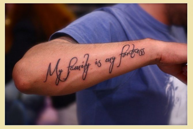 Tattoo on the arm: Family is my castle