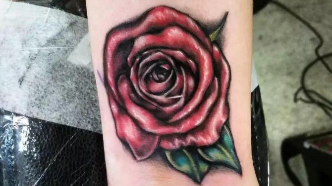 Tattoo of a rose on the wrist