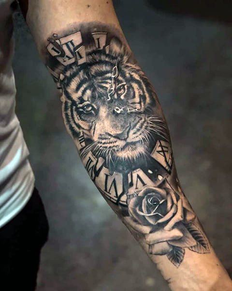 Tattoo of a tiger on hand