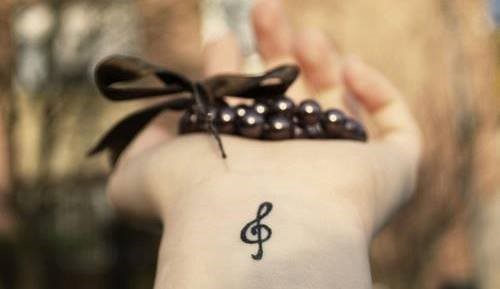 Tattoos for girls on the arm and their meaning. Photos, designs, beautiful, small, inscriptions