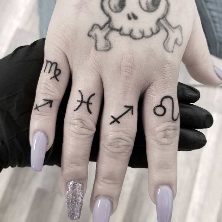 Tattoos on her finger