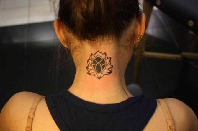 Tattoos on the back of a girl's neck