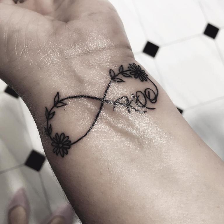 Sign of infinity on a girl's wrist